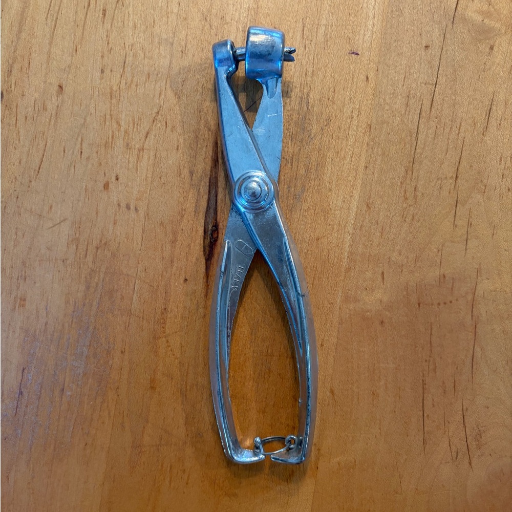 Vintage silver cast aluminum metal cherry /Olive pit remover  made in Italy